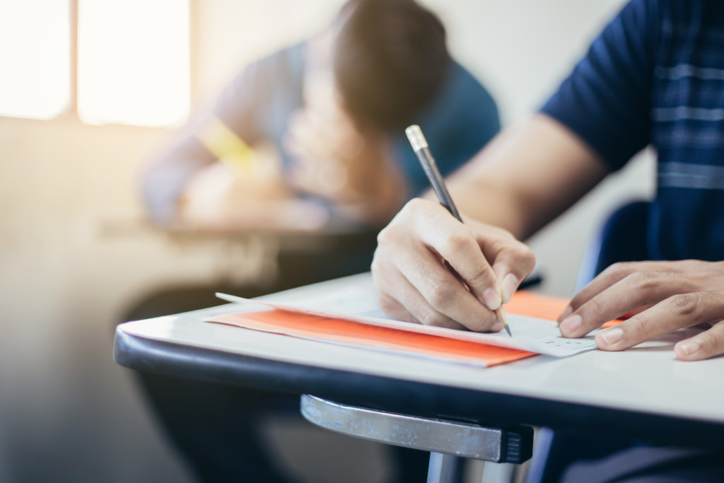 Students taking an exam in a classroom